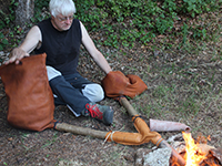 Experimental copper smelting using traditional hand bellows