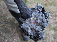 Slag containing small copper beads